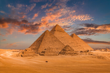 Sunset view of Pyramid complex of Giza, in Cairo, Egypt.