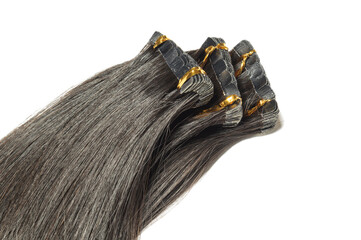close up of tape in adhesive virgin remy straight black human hair extensions