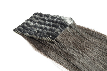 close up of tape in adhesive virgin remy straight black human hair extensions