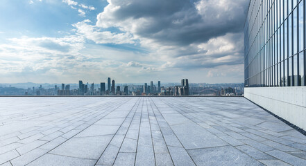 Empty floor with modern city skyline and buildings © ABCDstock