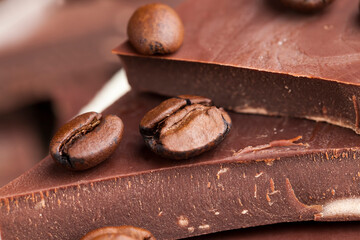 coffee and pieces of milk chocolate from cocoa