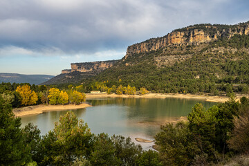Fototapeta na wymiar Rocky landscape with mountains lake La Toba reservoir. Serrania de Cuenca, Cuenca, Spain