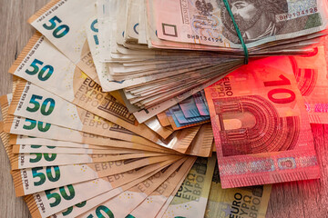 pln polish money and euro bills as finance background