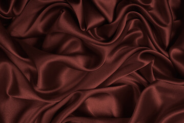 Fototapeta premium Rich and luxury red silk fabric texture background.
