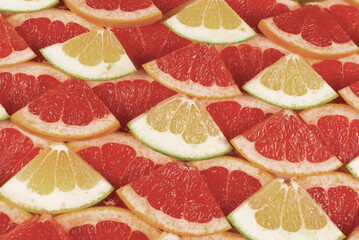 Pomelo and grapefruit slices background.