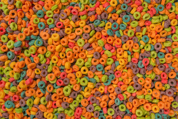 Sweet multicolored flakes, cereal loops.