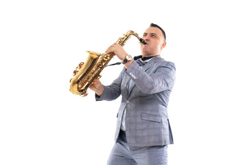 Fototapeta na wymiar Emotional Musician male in a suit plays on saxophone isolated on white background