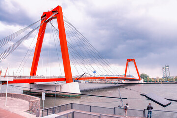 Red Willemsbrug over river Nieuwe Maas in Rotterdam, The Netherlands.