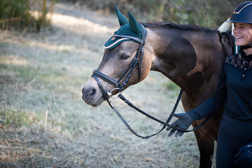 Fototapeta premium Mädchen mit Pferd
