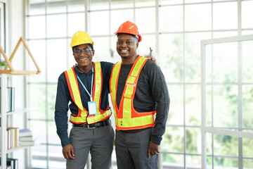 two technician man hugged each other and smiled happily. concept for good relationship in the workplace to achieving organizational objectives