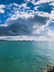 Dark clouds at the sea, evening time, dark seascape