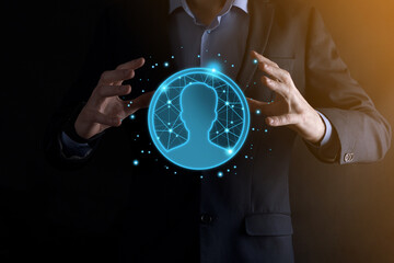 Businessman holding on hand icon of user man,woman low poly polygon style. Internet icons interface foreground. global network media concept.