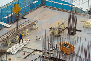 Worker working on a construction site in Saigon, Vietnam