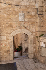 Fototapeta na wymiar The entrance to the Greek Church Saint Catherine in Jerusalem in Christian quarters in the old city of Jerusalem, Israel