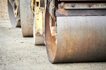Heavy construction machines outdoors for public place reconstruction.