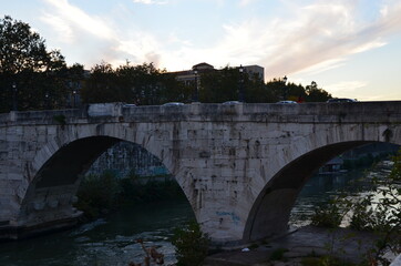 Fototapeta premium Some photos from the Eternal City of Rome, Italy, taken while strolling across the city centre and over the river Tiber on a sunny Fall day, with Rome's typical churches, bridges and statues