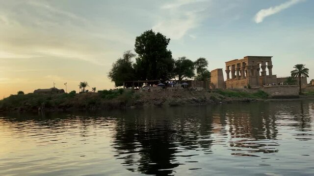 Most Beautiful Philae temple at sunset light the beautiful temple of Philae and the Greco-Roman buildings are seen from the Nile river a temple dedicated to Isis, goddess of love Aswan Egyptian