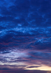 Fototapeta na wymiar Beautiful view of sky with clouds at sunrise. Partly cloudy. Colorful sunset. Natural blue sky background texture, beautiful color.