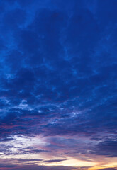 Fototapeta na wymiar Beautiful view of sky with clouds at sunrise. Partly cloudy. Colorful sunset. Natural blue sky background texture, beautiful color.