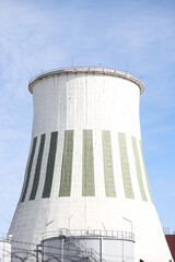 Close up photography of Large white thermal power plant chimney.