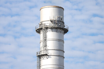 Close-up photography of industrial metallic silver chimney.