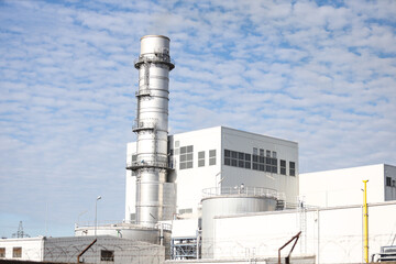 Industrial view of building and chimney.