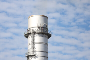 Close-up photography of industrial metallic silver chimney.