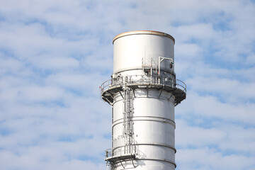 Close-up photography of industrial metallic silver chimney.