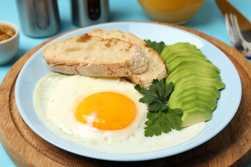 Concept of tasty breakfast on blue background