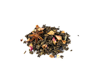 Green tea with buds of pink roses with anise star. Tea on a white background