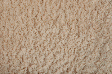 Texture of brown soft fluffy carpet