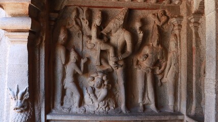The Varaha Cave Temple. ancient- Statues carved in rock. this is one features in several Hindu scriptures. rock backround