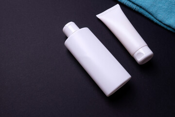 hand cream packaging on black background