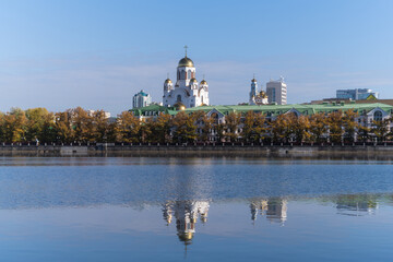 City autumn landscape made in Yekaterinburg (Russia) on a sunny day. The river embankment with old...