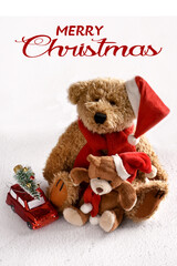 Christmas card with greetings and vintage style teddy bears with Santa cap on white snow background