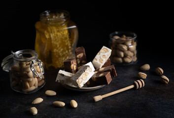 Chocolate covered nougat. Nougat with pistachios and almonds. These delicious confections are...
