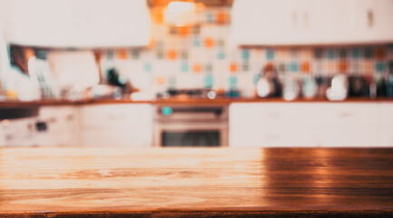 Obraz premium blurred kitchen interior and desk space home background