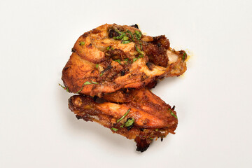 Spicy grilled chicken wing on white background
