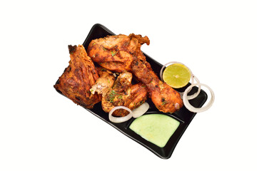 Top View of Tandoori Chicken in Plate Isolated on White Background with Clipping path