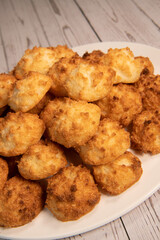 Rocher coco from coconut dessert in brown color make with white eggs and sugar