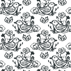 Vector seamless pattern of black birds with flowers. Hand drawn. Perfect for the design of textiles, wrapping paper, tiles.