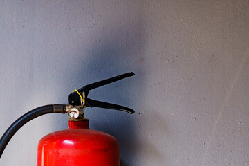 Fire extinguisher agains wall