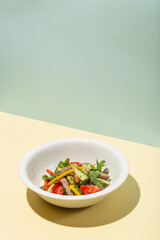 Grilled Beef Steak salad with greens vegetables. Healthy food. Hard shadows