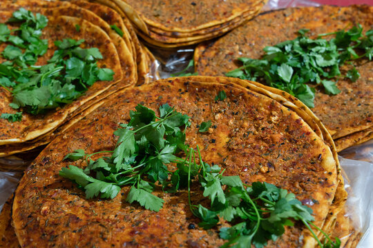 Peppered bread (Biberli ekmek in Turkish) served with parsley, one of the famous gastronomic products of the city of Hatay, Turkey