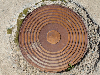 Sewer iron hatches in concrete at Rosa Khutor