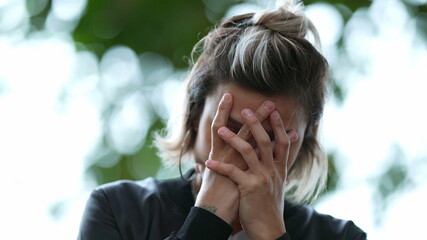 Desperate woman feeling regret worry and angst