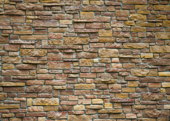 Texture of beautiful stones on the wall on the street