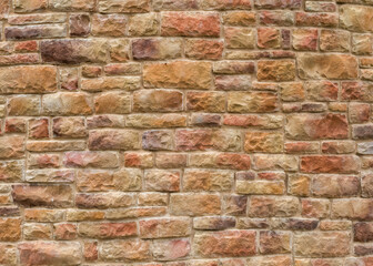 Texture of beautiful stones on the wall on the street