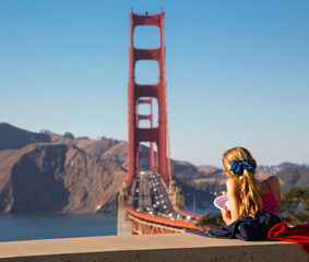 Golden Gate Bridge against the blue sky and mountains