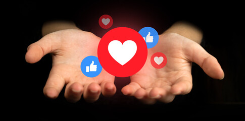 Modern social media concept. Hands with like notifications, like icons